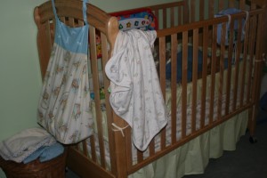 Diaper holder and crib bedding.